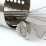 Hvordan rengører jeg min osteskærer?